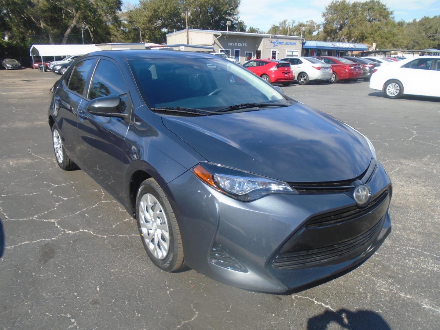 2018 Toyota Corolla (5YFBURHE9JP) , located at 6112 N Florida Avenue, Tampa, FL, 33604, (888) 521-5131, 27.954929, -82.459534 - Photo#2